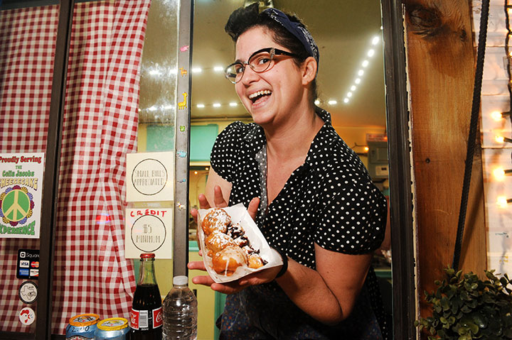 Fried and True owner Arielle Henson holds deep fried Oreos from her food trailer