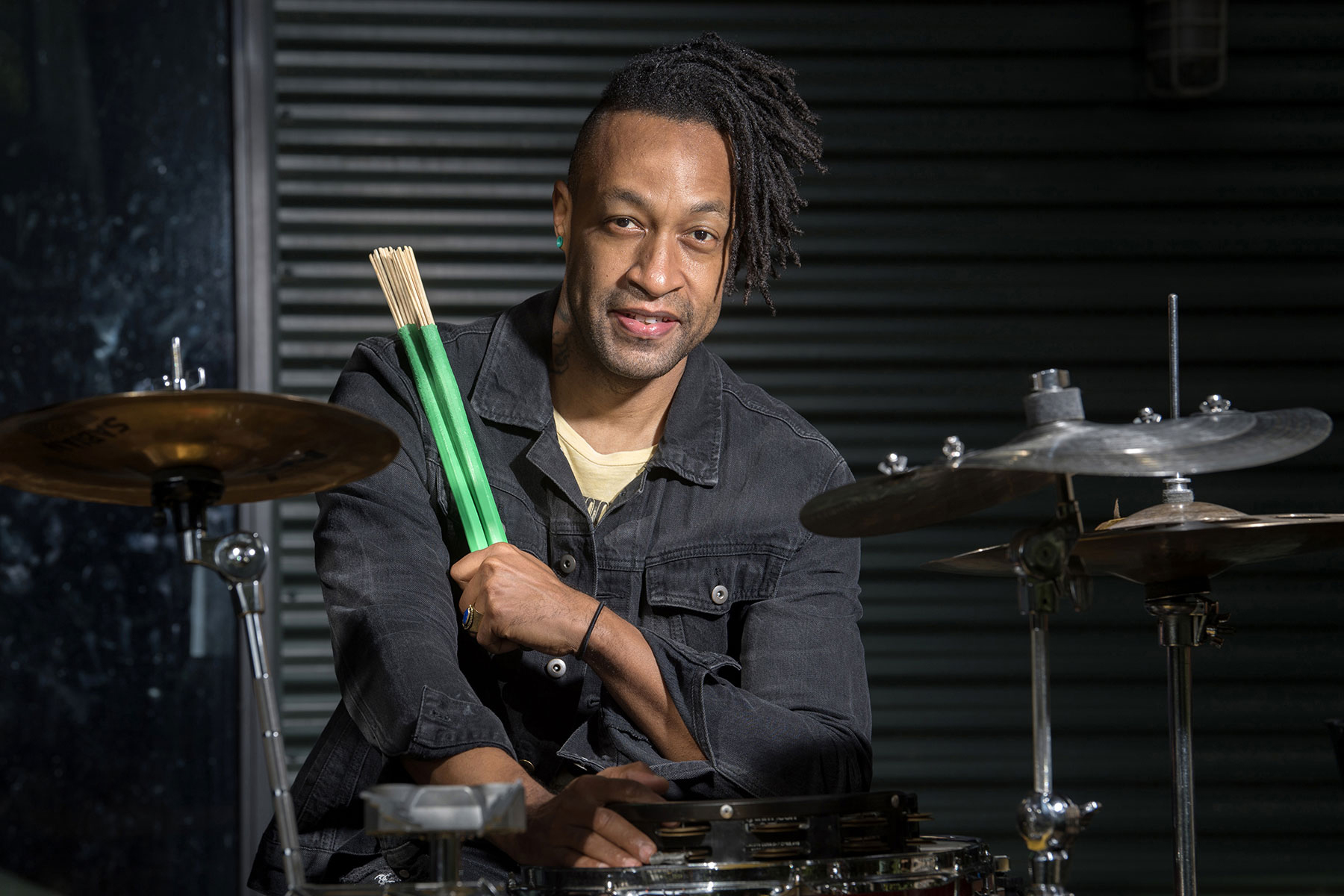 Drummer Brannen Temple sitting behind his drum set