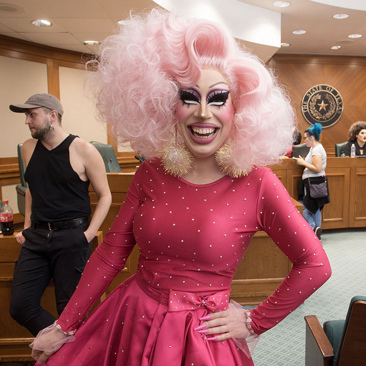 Drag performer Brigitte Bandit waits before testifying in front of the Texas Senate State Affairs Committee