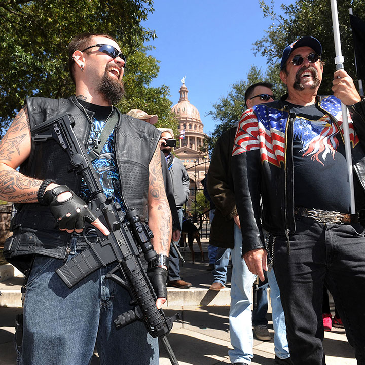 Open carry demonstrators gather in front of the Texas State Capitol