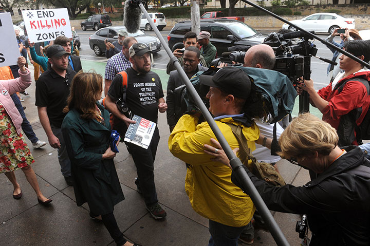  Gun rights activist and event organizer Murdoch Pizgatti speaks with media during an open carry demonstration