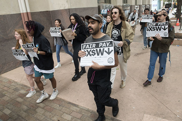 Union of Musicians and Allied Workers march at a Fair Pay at SXSW protest rally outside the Austin Convention Center during South By Southwest 2023 